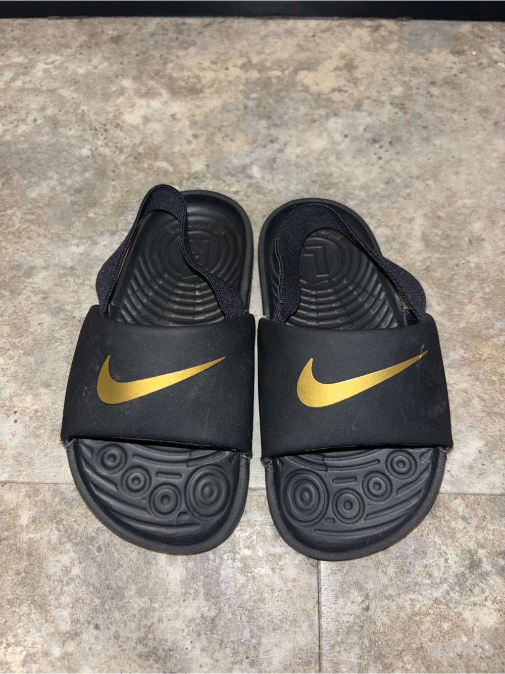 Nike Kids Black Slides with Gold Logo Size 8